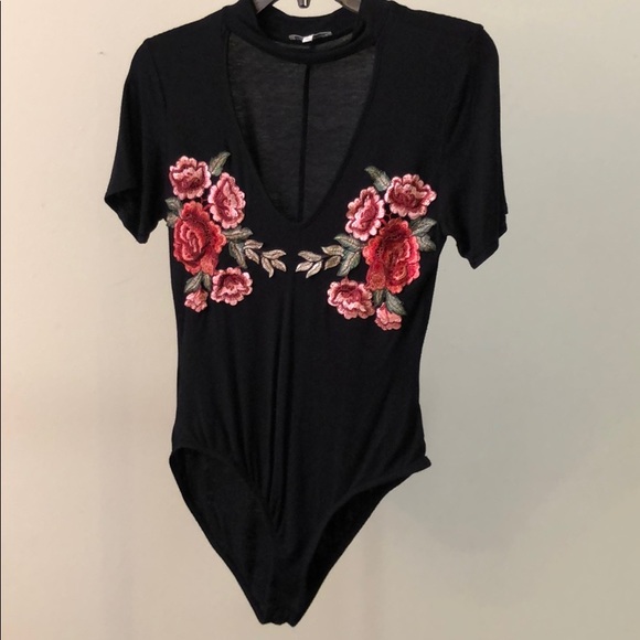 Charlotte Russe Tops - ⭐️ NWOT Deep V Mock Collar Flower Accent Bodysuit